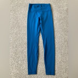 Size 8 teal women’s Lululemon yoga pants/athletic leggings